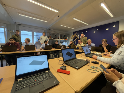 Picture of the PhD students of the reasearch unit during a workshop on 3D printing.